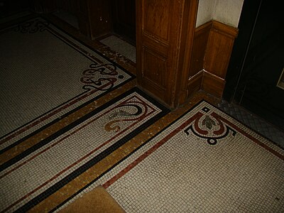 Mosaic floors in Quai Duguay-Trouin no. 30 in Rennes, France, designed by Emmanuel Le Ray (c. 1910)