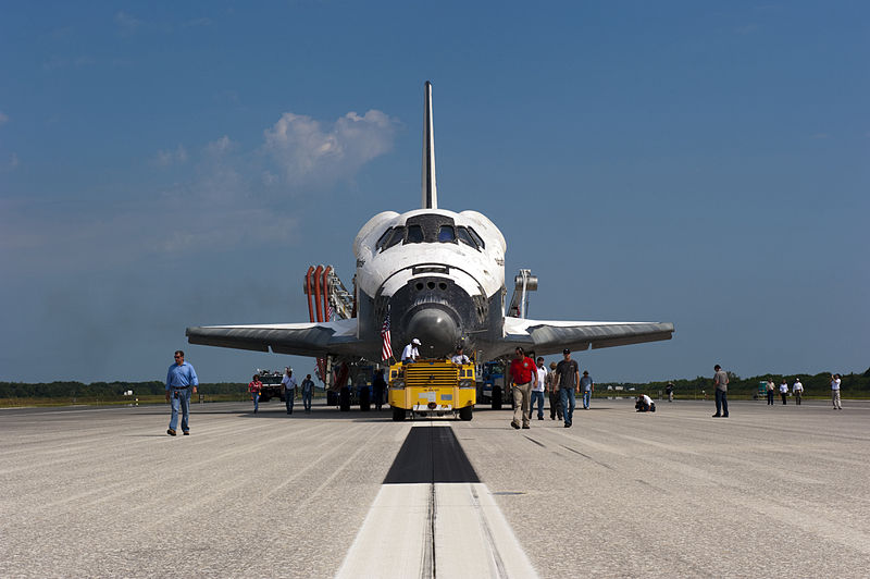 File:STS-135 Atlantis' final tow back.jpg