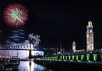 5. View of the Montreal Clock Tower, located in the Old Port, during a fireworks display. Author: Michael Vesia