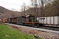 Illinois Central 1018, an EMD SD70, leads a Norfolk Southern mixed freight