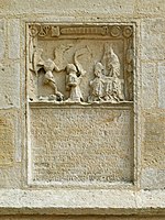 Relief and inscription stone in the south facade