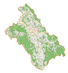 Mapa konturowa powiatu kłodzkiego, w centrum znajduje się punkt z opisem „Pałac w Wolanach(nieistniejący)”