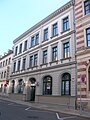 Bank- und Mietsgebäude in geschlossener Bebauung