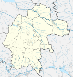 Mapa konturowa powiatu strzeleckiego, po lewej nieco na dole znajduje się czarny trójkącik z opisem „Góra Świętej Anny”