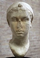 Cleopatra, mid-1st century BC, with a "melon" hairstyle and Hellenistic royal diadem worn over her head, now in the Vatican Museums[1][3][429]