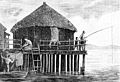 PSM V24 D321 A primitive stilt house in Switzerland on wood pilings.