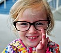 An American girl wearing glasses in Texas, USA