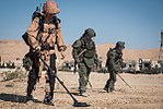 Russian sappers in Palmyra, Syria. Soldier on the left is wearing the desert variant of EMR camouflage