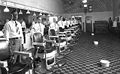 Staff of Draper's Barber Shop, Franklin Street, Martinsville, 1920. White bowls on floor are spittoons[193]