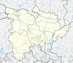 Mapa konturowa powiatu tarnogórskiego, blisko centrum na dole znajduje się punkt z opisem „Stare Tarnowice”