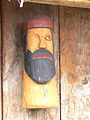 Sculpture of God Wotan, attached at the outside of reconstructed Viking house