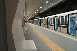 S/300 train into Conca d'Oro station, on platform 1