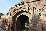 Kashmiri Gate and portion of the City Wall on either side of the Kashmiri Gate on the side and on the other up to and including the water Bastions at the Northern corner of the wall and also including the dith outside the City wall where this is exposed.