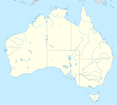 Mapa konturowa Australii, blisko lewej krawiędzi znajduje się punkt z opisem „Three Springs”