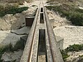 Jalur Decauville pada sebuah jembatan kecil, Costa da Caparica, Portugal