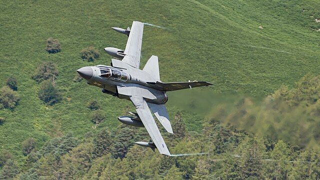 Royal Air Force (RAF) Panavia Tornado GR4 ZA607 EB-X flying past Corris Corner in Mach Loop, Wales, United Kingdom.