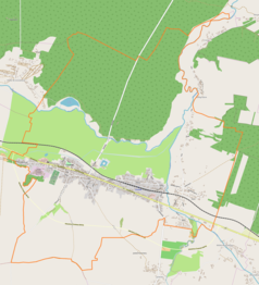 Mapa konturowa Ćmielowa, blisko lewej krawiędzi znajduje się punkt z opisem „Podkościele”