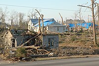 There is damage to mobile homes and other temporary structures becomes significant, and cars and other vehicles can be pushed off the road or flipped. Permanent structures can suffer major damage to their roofs.