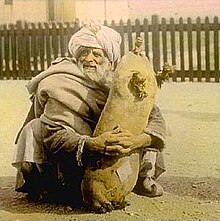 William Henry Jackson-Man with sheepskin full of water.jpg