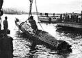 Image 88A Japanese Ko-hyoteki-class midget submarine, believed to be Midget No. 14, is raised from Sydney Harbour (from History of the Royal Australian Navy)