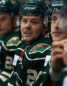 Photographie couleur d'un joueur de hockey sur glace