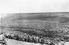 A large open area, with many prisoners of war