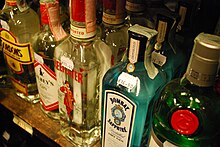 Assorted gin bottles on a store shelf.jpg