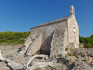 Buttresses supporting 14th-century chapel of St. Lucas near Jelsa, Croatia