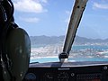 A Piper PA-28 Cherokee light aircraft on short final for, at the time, Runway 09.