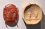 Seal with two facing busts and Sogdian inscription "Indamic, Queen of Zacanta", Kushano-Sasanian period, 300-350 CE. British Museum 119999.[12]