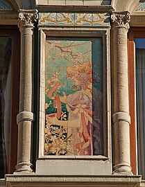 Hand-painted tile panel on the façade of the Grande Maison de Blanc in Brussels, designed by Privat Livemont and made by the Boch Frères Kéramis (1897–98)[217]