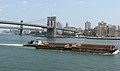 Towboat in front of Brooklyn Bridge