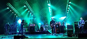 Mogwai at the Royal Festival Hall in 2014. (l-r) John Cummings, Luke Sutherland, Barry Burns, Martin Bulloch, Dominic Aitchison, Stuart Braithwaite