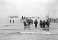 American troops unload stores from LCA 26 at Beach Z, near Arzeu