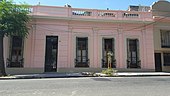 Façade of a typical "Casa Chorizo" house with different ornaments and colors in Buenos Aires (Argentine)