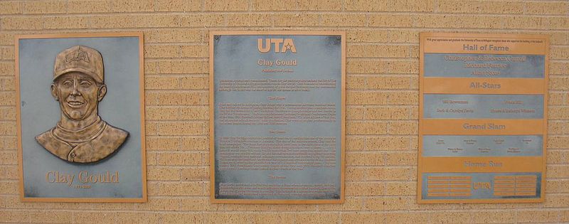 A The memorial Clay Gould and fundraising plaques outside the entrance to Clay Gould Ballpark.