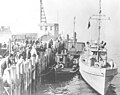 CG-262 with seized tug Elcisco and barge Redwood City docked in San Francisco Harbor, 1927.