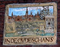 Gable stone on 'In the Old Schans' in the wall of the Amsterdam Museum