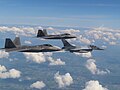 US Air Force F-22 Raptors in formation flight with a Romanian F-16 over Câmpia Turzii, 23 May 2023