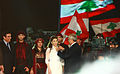 Majida El Roumi dihormati oleh P. Michel Suleiman semasa konsertnya di Jounieh pada Jun 2011.