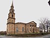 Georgian church with a tall spire and a classical portico