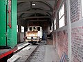 Dans le fond du hangar un autre train utilisé au Bois du Cazier à Marcinelle