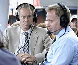 John (links) en Patrick McEnroe tijdens de US Open 2009