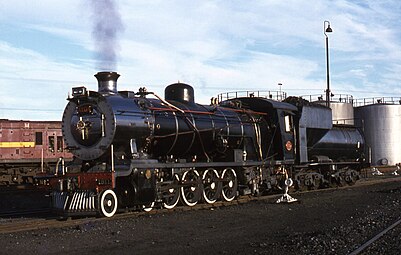 Reboilered no. 1911 with a Type MY tender, De Aar, 1978