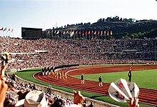 A stadium with thousands of spectators