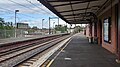 Eastbound view from Platform 2 underneath the platform's canopy, August 2024