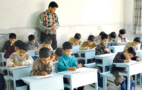 Elementary school teacher dictating students - 2003, Tehran.png