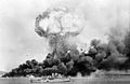 Image 59An oil storage tank explodes during the first Japanese air raid on Darwin on 19 February 1942 (from Military history of Australia during World War II)