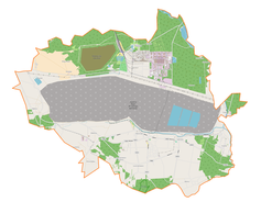 Mapa konturowa gminy Kleszczów, blisko centrum u góry znajduje się punkt z opisem „Kopalnia Węgla Brunatnego „Bełchatów””