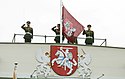 The presidential version of the coat of arms, as depicted on the Presidential Palace, and the flag of the president of Lithuania